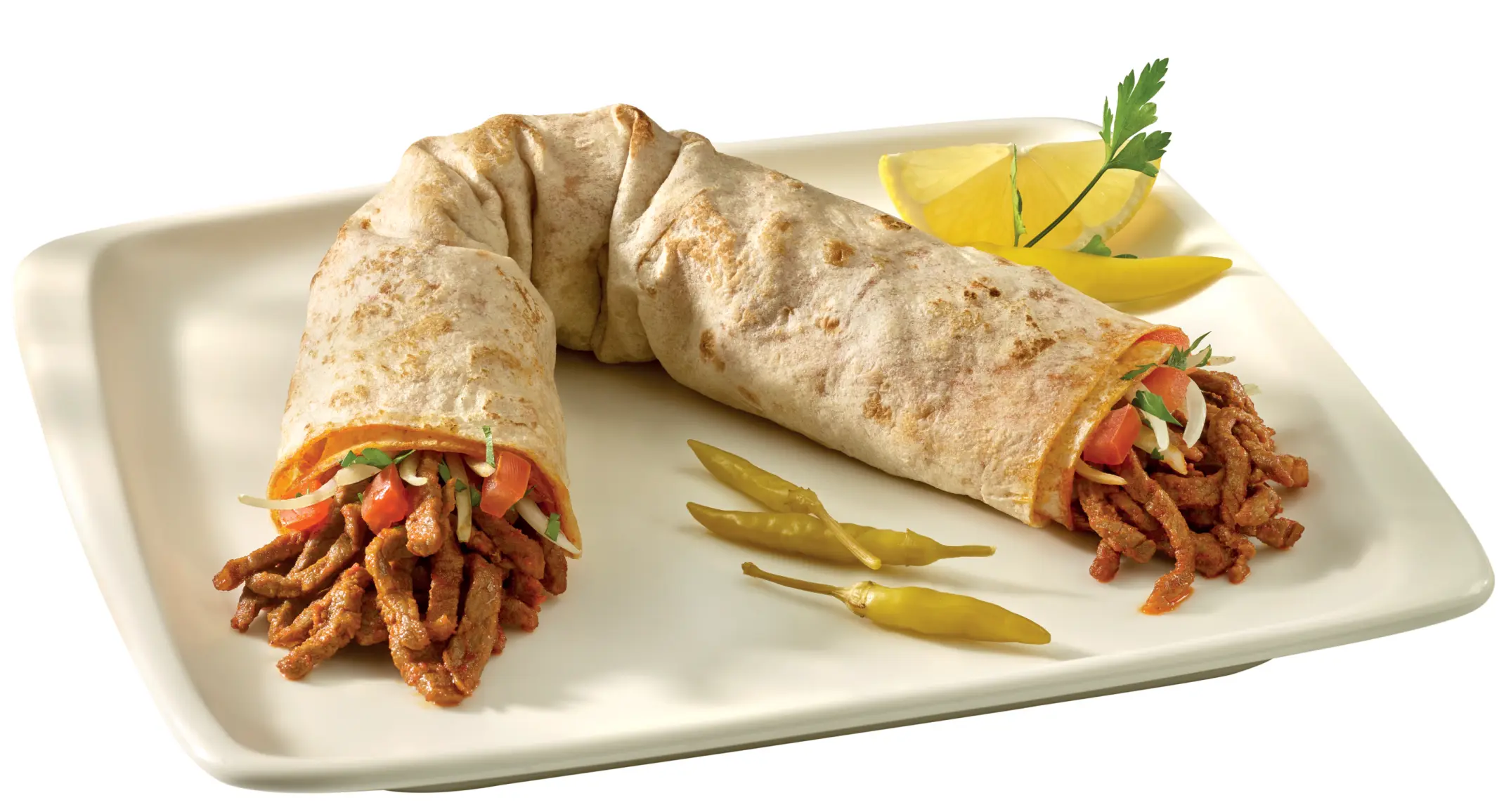 Ayla Tantuni'nin taze lavaşa sarılmış bol malzemeli et tantuni dürümü